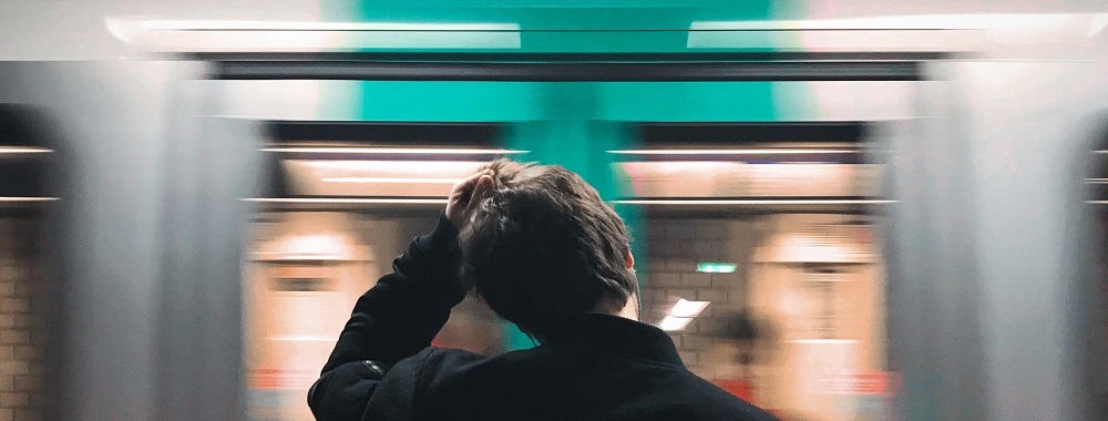 Timelapse photography of man in black jacket