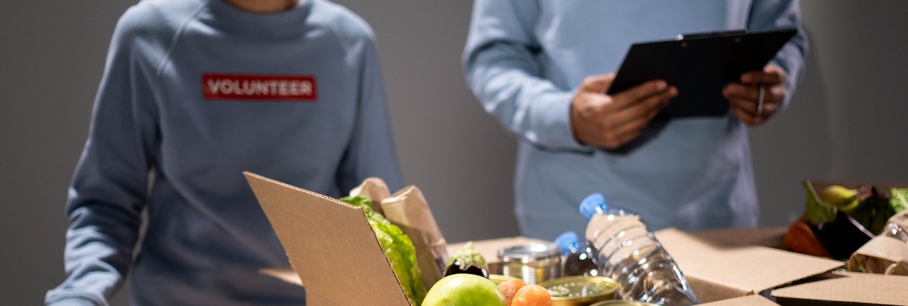 Volunteers working in food bank charity