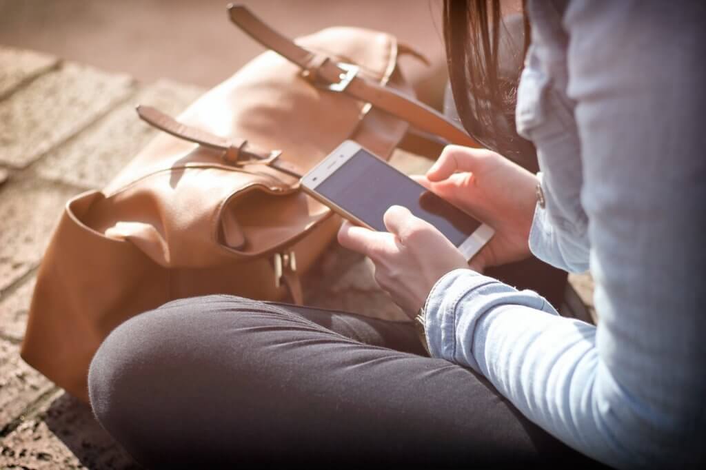 woman holding a phone